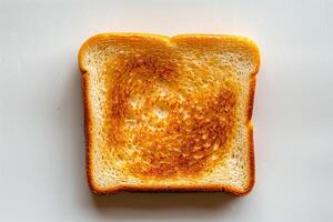 One slice of toast bread top view white background photo