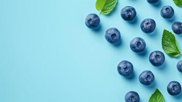 perfect blueberry isolated on baby blue background with a place for text photo