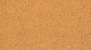 Close-Up Texture of Empty Cork Bulletin Board photo
