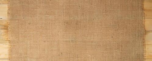 Burlap Fabric Texture on Wooden Surface, Rustic Background Concept photo
