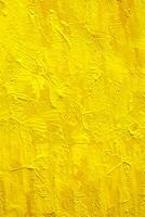 Vibrant Yellow Abstract Painting Background. photo