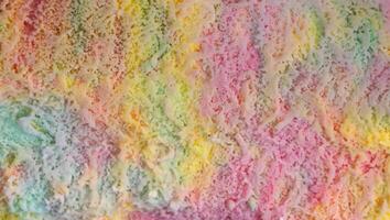 Vibrant Array of Flavored Ice Creams on White Surface, Top View with Copy Space for Design - Food Concept photo