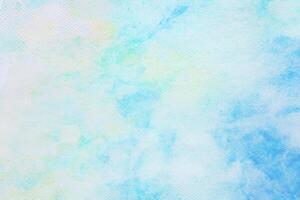 cloudy sky with gradient pastel color nature abstract background on the texture of the watercolor painting paper photo