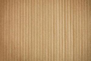 High-Resolution Close-up of Brown Cardboard Texture for Background Use photo