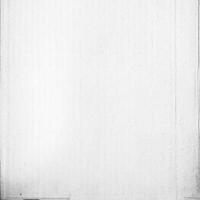 Close-up of Textured Rough Paper Surface for Background or Design Element photo