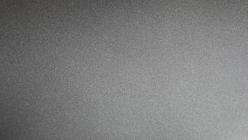 Dark Gray Matte Texture, Ideal for Backgrounds, Backdrops, and Design Elements photo
