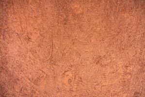 Red Sandy Surface Imprinted with Shoe Tracks, Texture Background photo