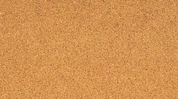 Close-Up Texture of Empty Cork Bulletin Board photo