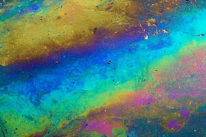 Vibrant Oil Sheen, Colorful Reflections on Water Surface photo