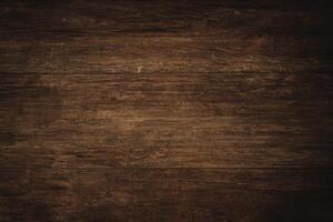 Clásico grunge texturizado de madera antecedentes en oscuro marrón foto