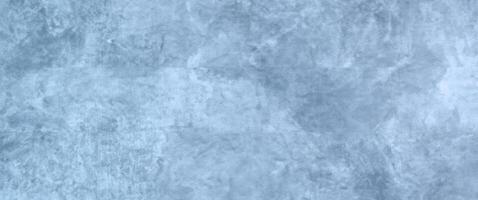 Winter-themed Abstract Background with Text or Image Space, Highlighted Blue Concrete Wall Texture, and Cloudy Distressed White Painting. photo