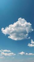 Single Cloud Drifting in Sky Above Beach photo