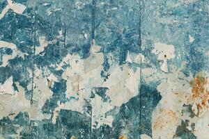 Crumpled Poster Texture, Abstract Grunge Background from Worn Billboard Advertisement photo