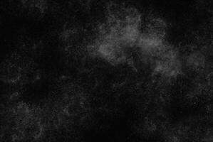 Monochrome Dust Overlay, Abstract Grunge Texture with Particle Effect, Isolated on Black Background photo