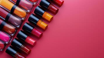 Row of Lipsticks Against Wall photo