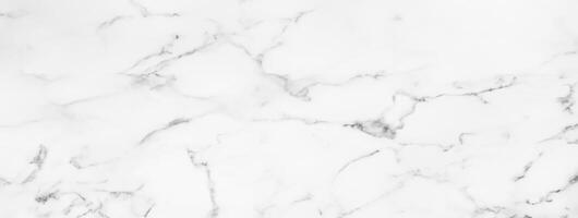 White Marble Texture, Ideal for Backgrounds or Decorative Tile Flooring photo