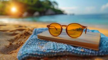 Sunglasses on Top of a Book photo