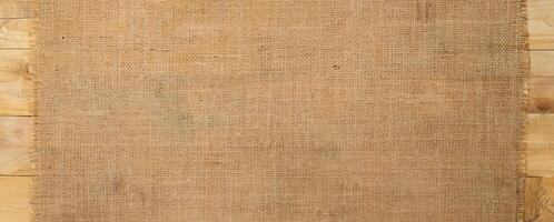 Burlap Fabric Texture on Wooden Surface, Rustic Background Concept photo