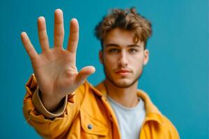 A man with his hands up in front of him photo