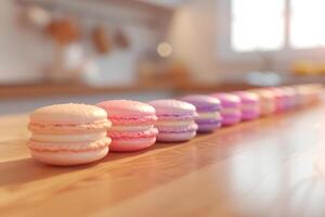 Assorted Macarons in a Modern Kitchen, Row of colorful macarons placed neatly on a wooden countertop, with a modern kitchen setting in the background. photo