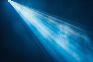 Ethereal Blue and White Light Rays on Black Background photo