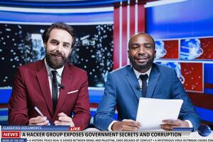 News about hackers revealing state secrets through classified documents discovered on servers, journalists team broadcasting live. Two reporters presenting government information exposed. photo