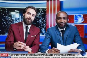 During daily events segment, reporters delivered superstorm news detailing natural calamity on shoreline. On live televised transmission, journalists team reporting storm as weather forecast. photo