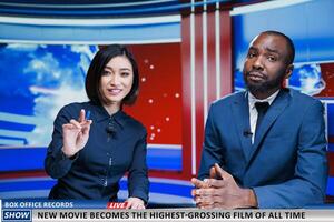 Reporters present new movie breaking charts, news report analysts talking about film bringing down box office records. Team of diverse journalists reading headlines, daily events. photo