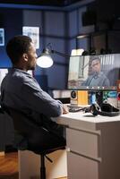 Applicant meeting with recruiter at remote job interview, attending videocall connection to ask questions and discuss about hiring. Person talking to coach trainer on online conference. photo