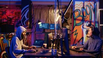 Hacker arriving in underground base, ready to do computer sabotage using encryption trojan ransomware. Cybercriminals asking victims to pay money to ransom their stolen data photo
