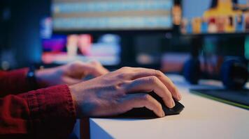 Photo editor color correcting photographs in creative studio using mouse and keyboard, close up shot. Photographer selecting best pictures for editorial content using retouching software, zoom in