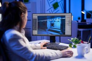 Editor developing new movie project, editing audio film montage sitting in production office late at night. Creative content creator using professional computer, modern technology, network wireless photo