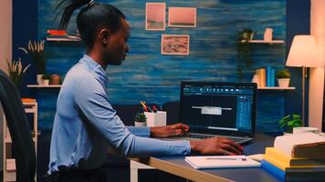 African american remote woman architect working on modern cad program overtime. Industrial black female engineer studying prototype idea on personal computer showing software on device display photo