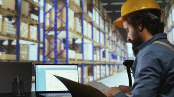 Export supervisor drafting billing for product logistics, managing shipping and delivery requirements. Factory operator reviewing dispatch reports for order submission and stock control. photo