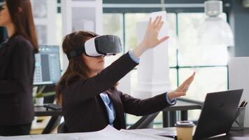 Architect designing project blueprints and plans with vr headset, using artificial intelligence to shape new property layout. Specialist working with virtual reality glasses at real estate agency. photo