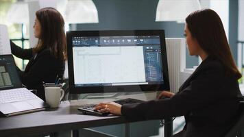 Graphic designer using CAD tool to create layout sketch for property remodeling, working on designing architectural blueprints. Architect developing new floor plan for a household. Handheld shot. photo