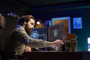 Man inserting classified disk into PC containing software turning AI into self aware being. Scientist placing confidential cartridge in computer, awakening sentient artificial intelligence photo