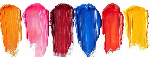 Colorful palette of acrylic paint strokes on white background. Assorted vibrant swatches. Concept of creativity, color, art techniques, and design. Colorful paint stains isolated on white background photo