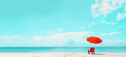 Beach umbrella with chair on sandy beach. Single umbrella and chaise lounge setup by the sea. Concept of relaxation, beach leisure, sun protection, and vacation. Banner. Copy space photo