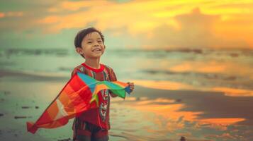 Young Asian boy flying a colorful kite at sunset. Child playing with a vibrant kite on the beach during sunset. Concept of outdoor activity, childhood joy, leisure photo