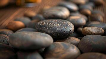 Close-up of multicolored spa stones with fine textures, arranged closely. Concept of natural elements in wellness and relaxation therapies. photo