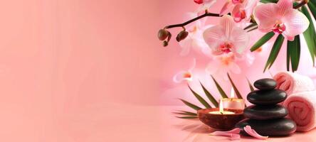 Elegant spa setting with lit candles, orchid flowers, towels. Calming pink wellness retreat for relaxation. Concept of luxury Thai spa, tranquility, self-care, health retreat. Banner. Copy space photo