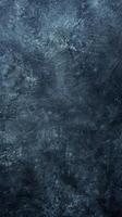 Dark abstract textured background with rough patterns. Concept of grunge, industrial design, textured surface, artistic backdrop. Copy space. Vertical photo