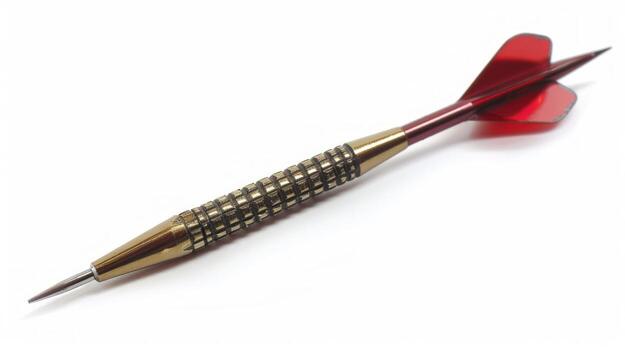 Metallic dart with red wings isolated on a white background. Concept of precision sport, dart game, accuracy, and competition photo