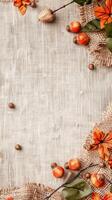 Rustic burlap texture adorned with acorns and autumn leaves. Seasonal border with fall elements on a linen background. Concept of autumn crafts, natural decor, and harvest textures. Copy space. photo