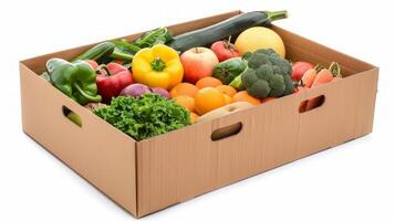 Fresh and colorful assortment of fruits and vegetables in a cardboard box. Organic produce collection. Concept of healthy eating, farm produce delivery, natural food. Isolated on white background photo