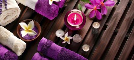 Luxurious spa setting with purple accents and floating candles. Spa arrangement with flowers and woven decorations. Concept of relaxation, luxury, and aesthetic spa environment. Copy space photo