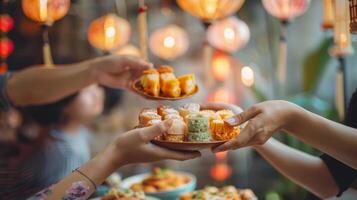 Diverse hands sharing traditional dim sum dishes in a lantern-lit Asian setting. Cultural food exchange, sharing, Asian cuisine, social dining concept photo