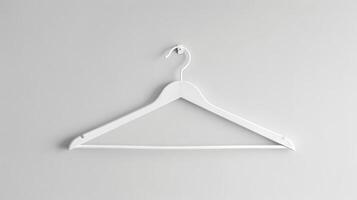 White Clothes Hanger on Plain White Wall. Concept of Organization, Minimalism, Simplicity, Interior Design photo