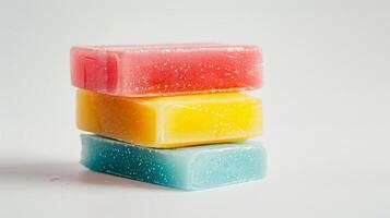 Colorful artisan soap bars, isolated on light background. Handcrafted soaps. Concept of freshness, cleansing, and vibrant bath essentials. photo